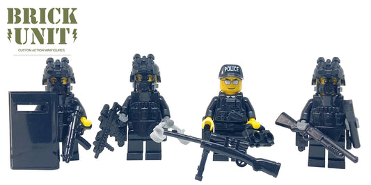 Four custom  LEGO minifigures of police swat officers in black uniform with tactical gear and weapons .