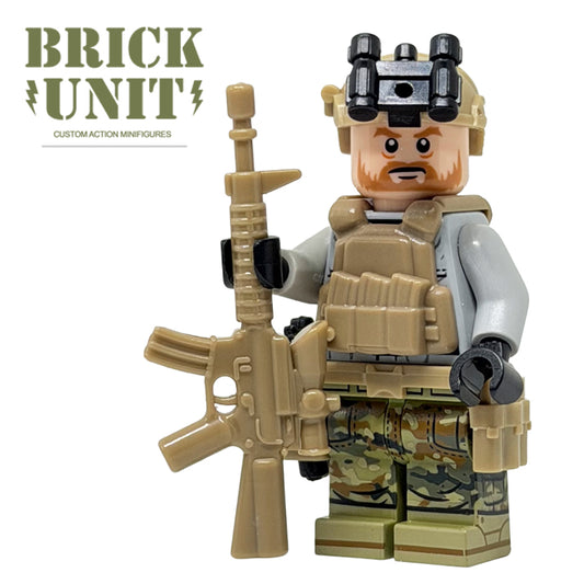 a custom lego special forces operator minifigure with helmet and nvg,tactical gear,OCP camo pants,and a m4 rifle.